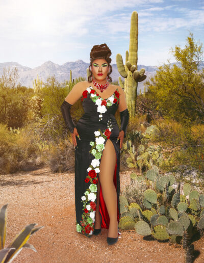 Dulce wearing a dark green slit dress with red and white flowers and matching gloves.