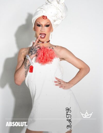 Rosie in a bath-towel inspired costume posing in a promo photo for Absolut Empire's Ball Season Five.