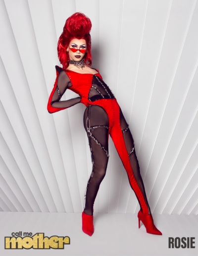 Rosie in a black and red punk-inspired bodysuit, posing for a promo photo for Call Me Mother Season One.